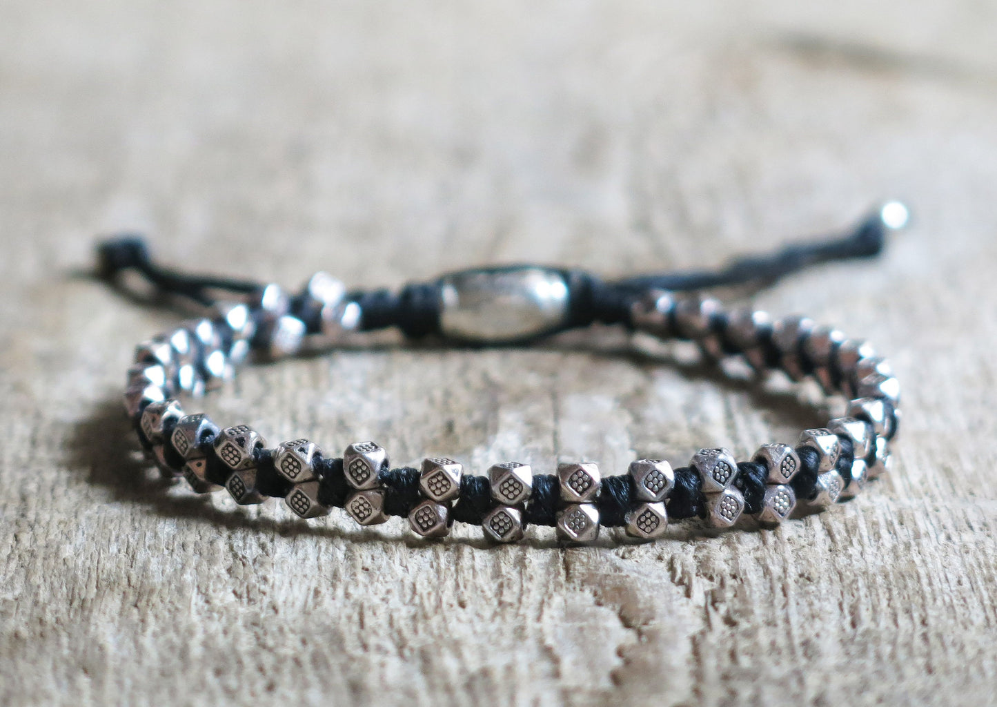 SAUL - Tibetan style knotted bracelet with adjustable sliding knot for closure.