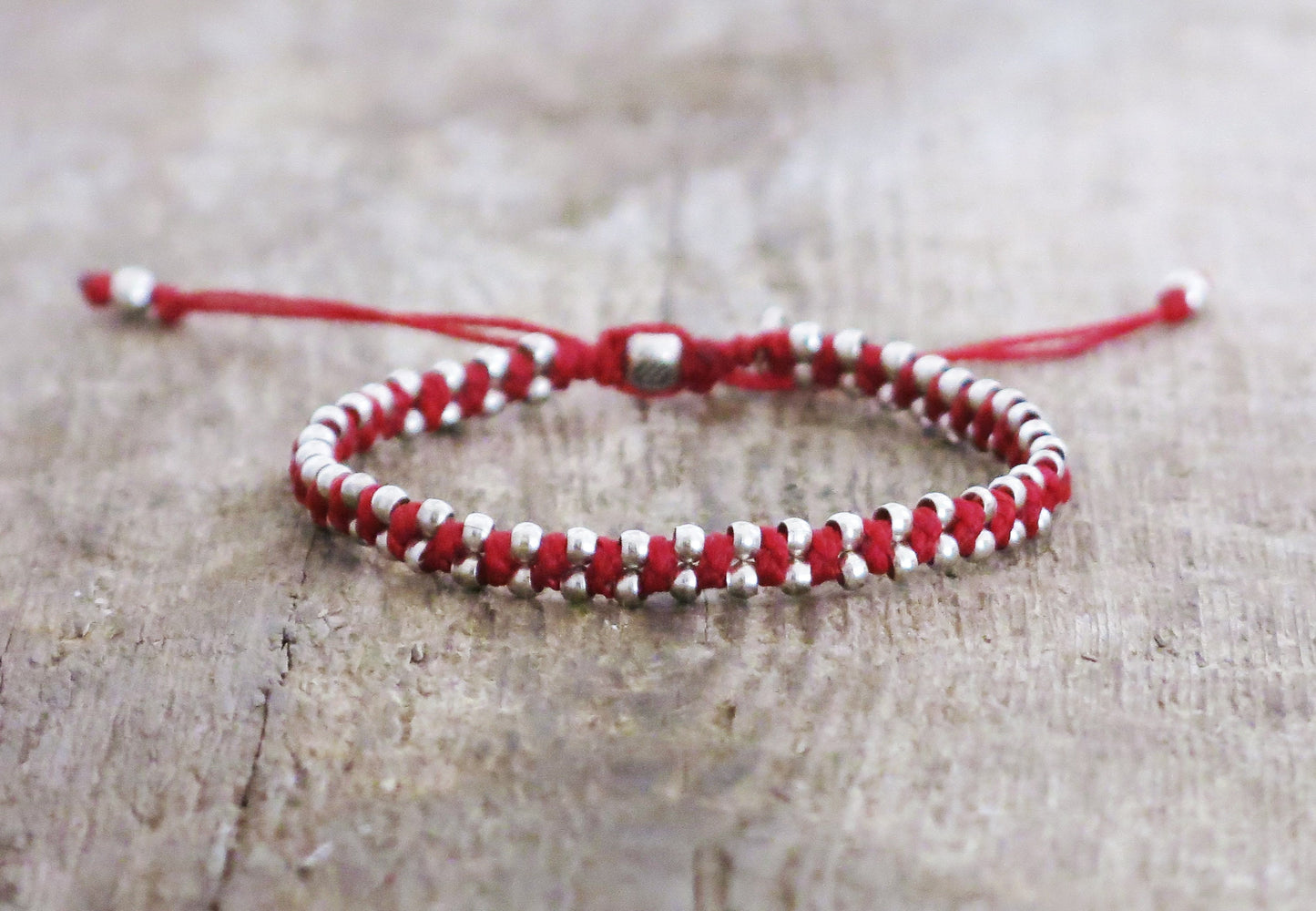 SAUL - Tibetan style knotted bracelet with adjustable sliding knot for closure.
