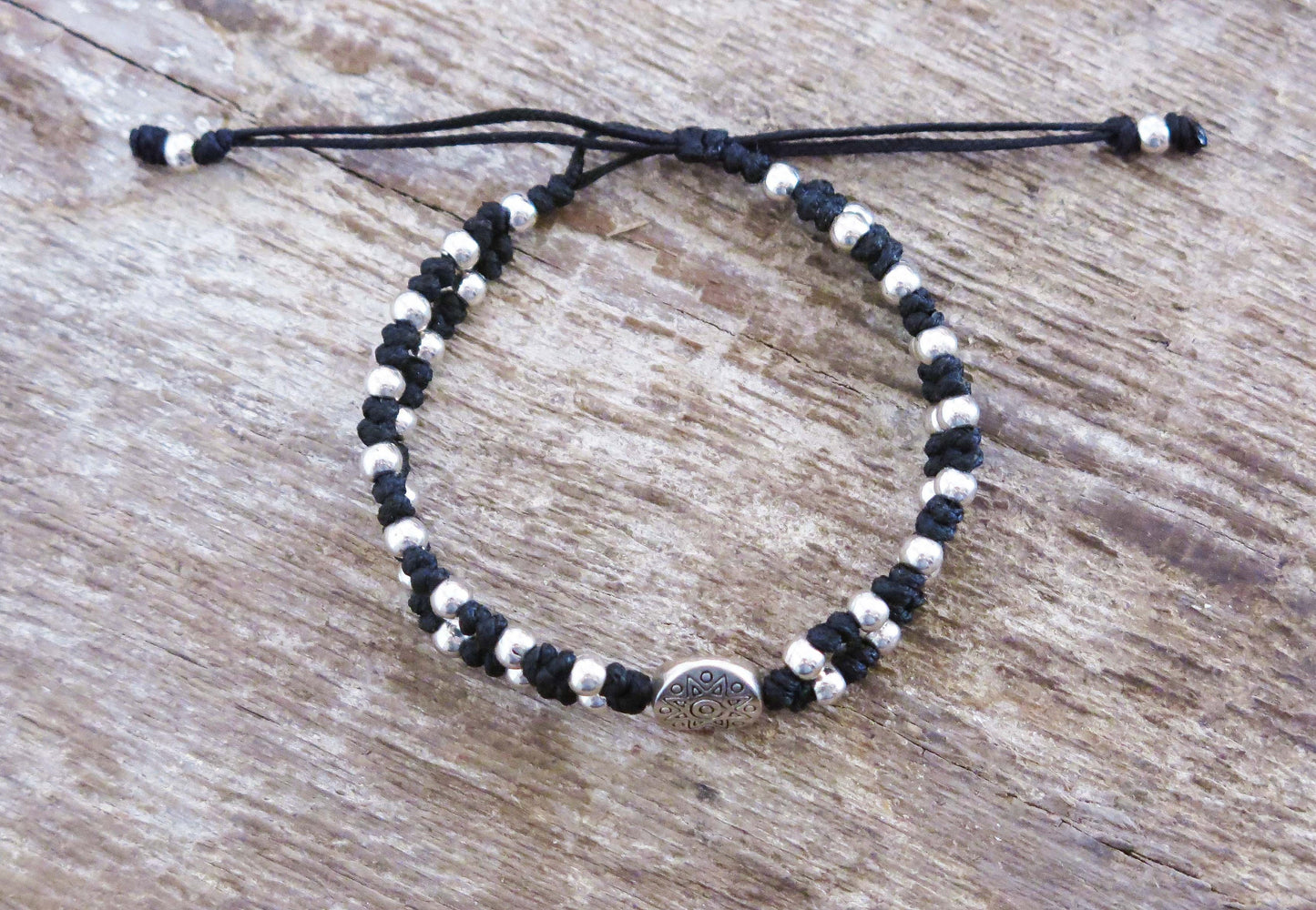 BLACKY - Tibetan style knotted Bracelet with metallic Beads