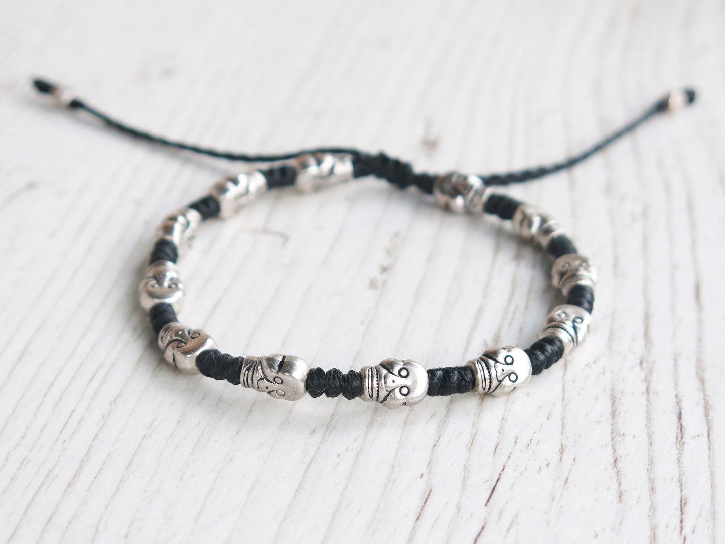 DEADHEAD - knotted bracelet with Skull beads and adjustable sliding knot for closure.