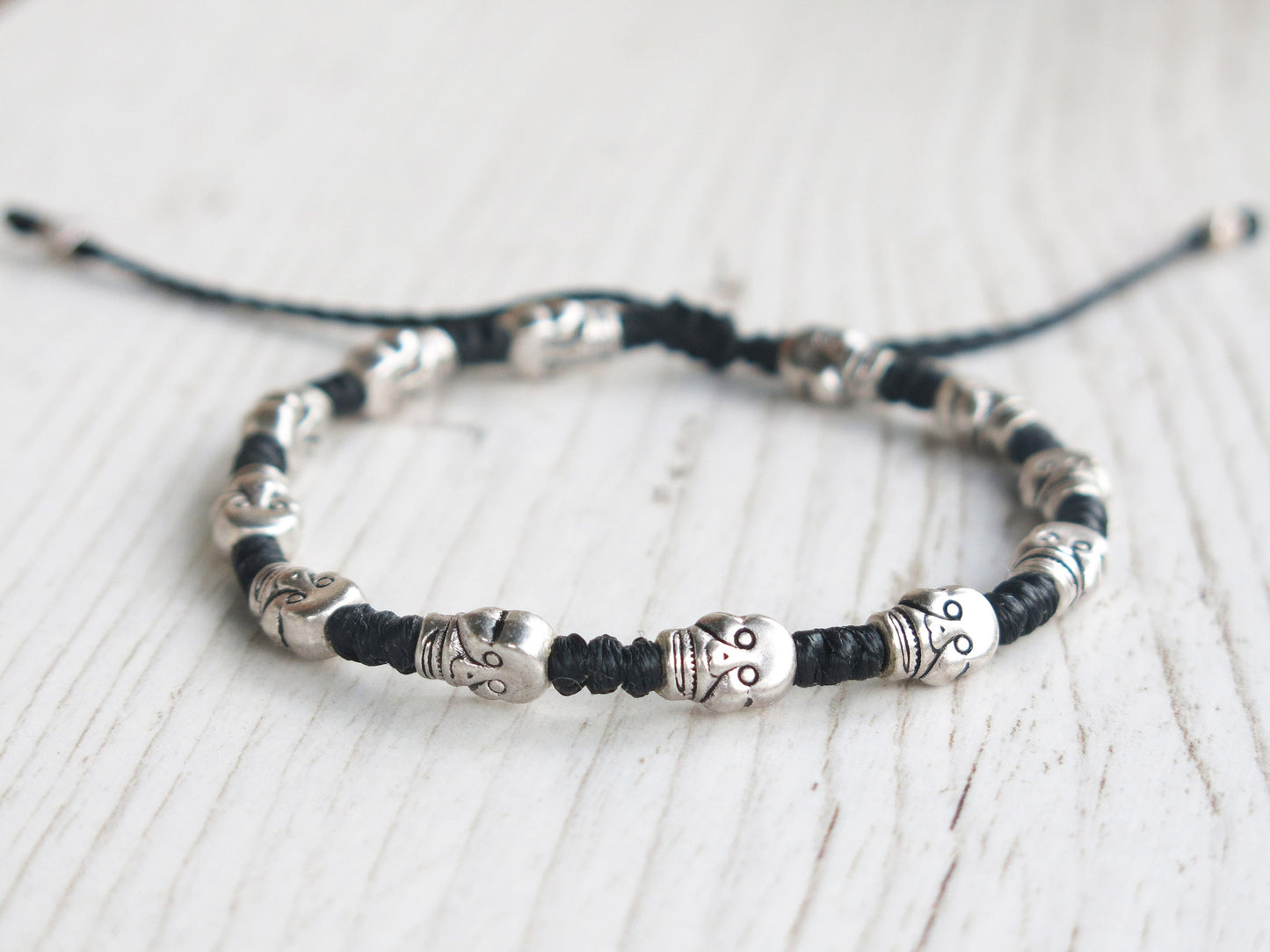 DEADHEAD - knotted bracelet with Skull beads and adjustable sliding knot for closure.