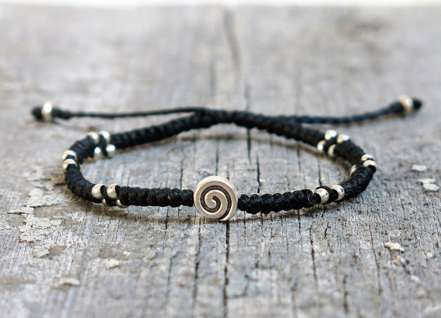 VICO - Minimalist knotted bracelet with adjustable sliding knot for closure.
