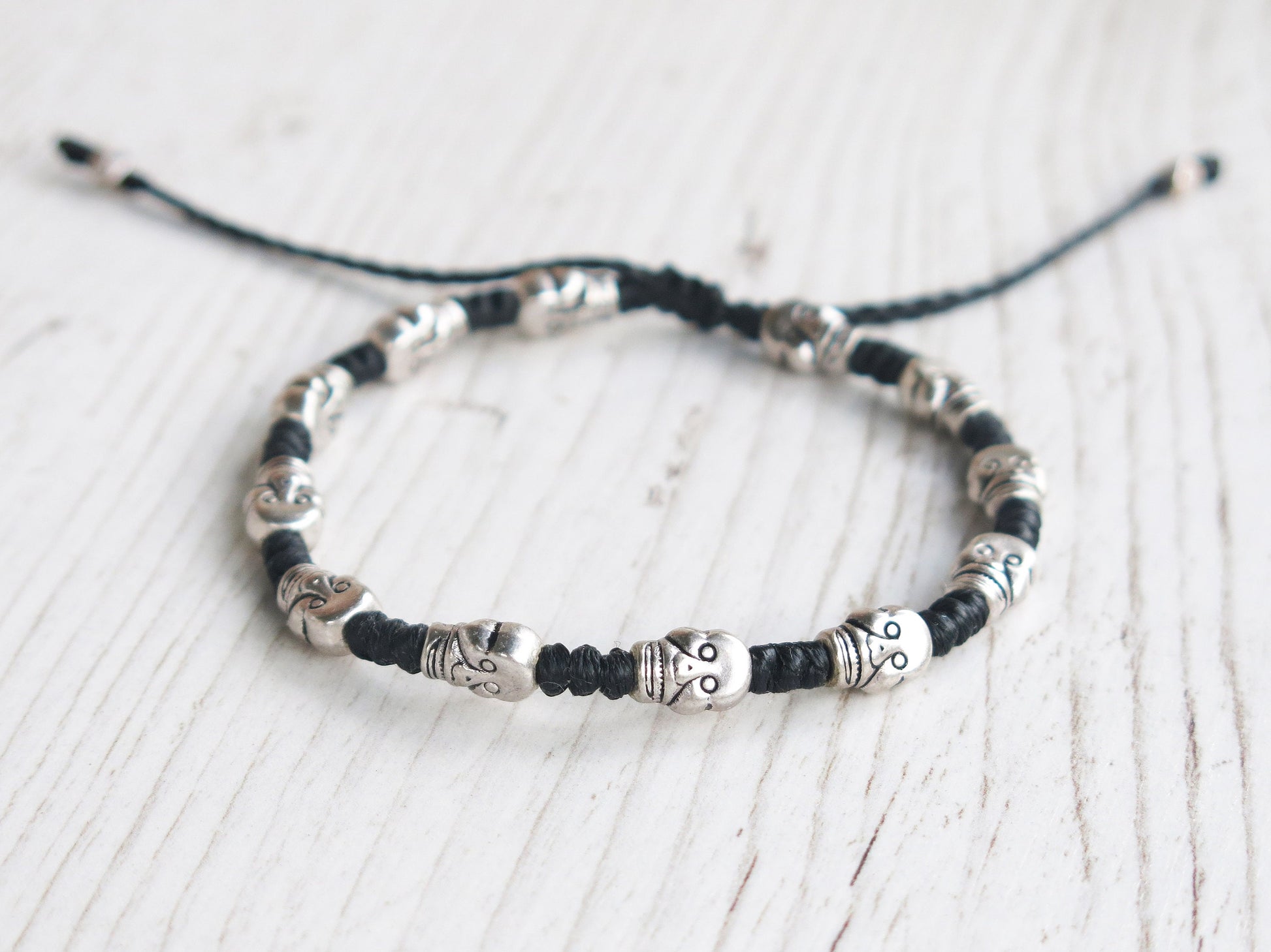 DEADHEAD - knotted bracelet with Skull beads and adjustable sliding knot for closure.