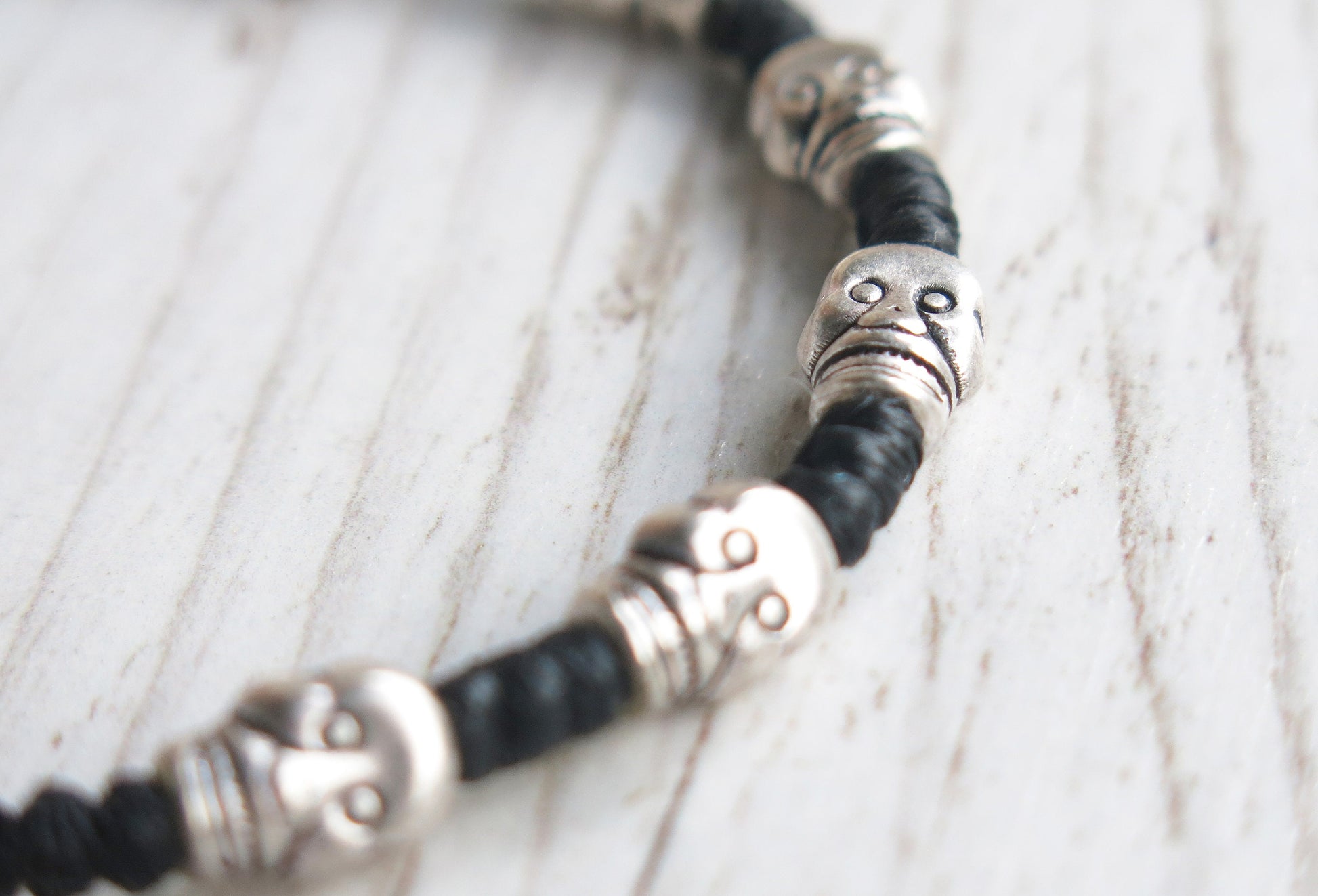 DEADHEAD - knotted bracelet with Skull beads and adjustable sliding knot for closure.